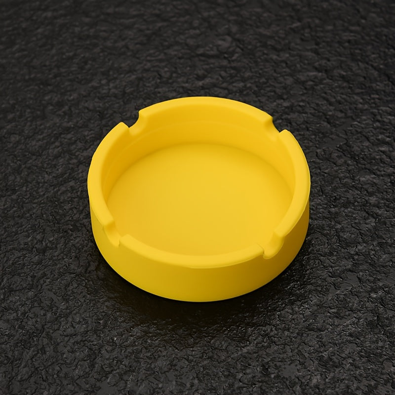 Round silicone ashtray for home or office use, suitable as a gift.