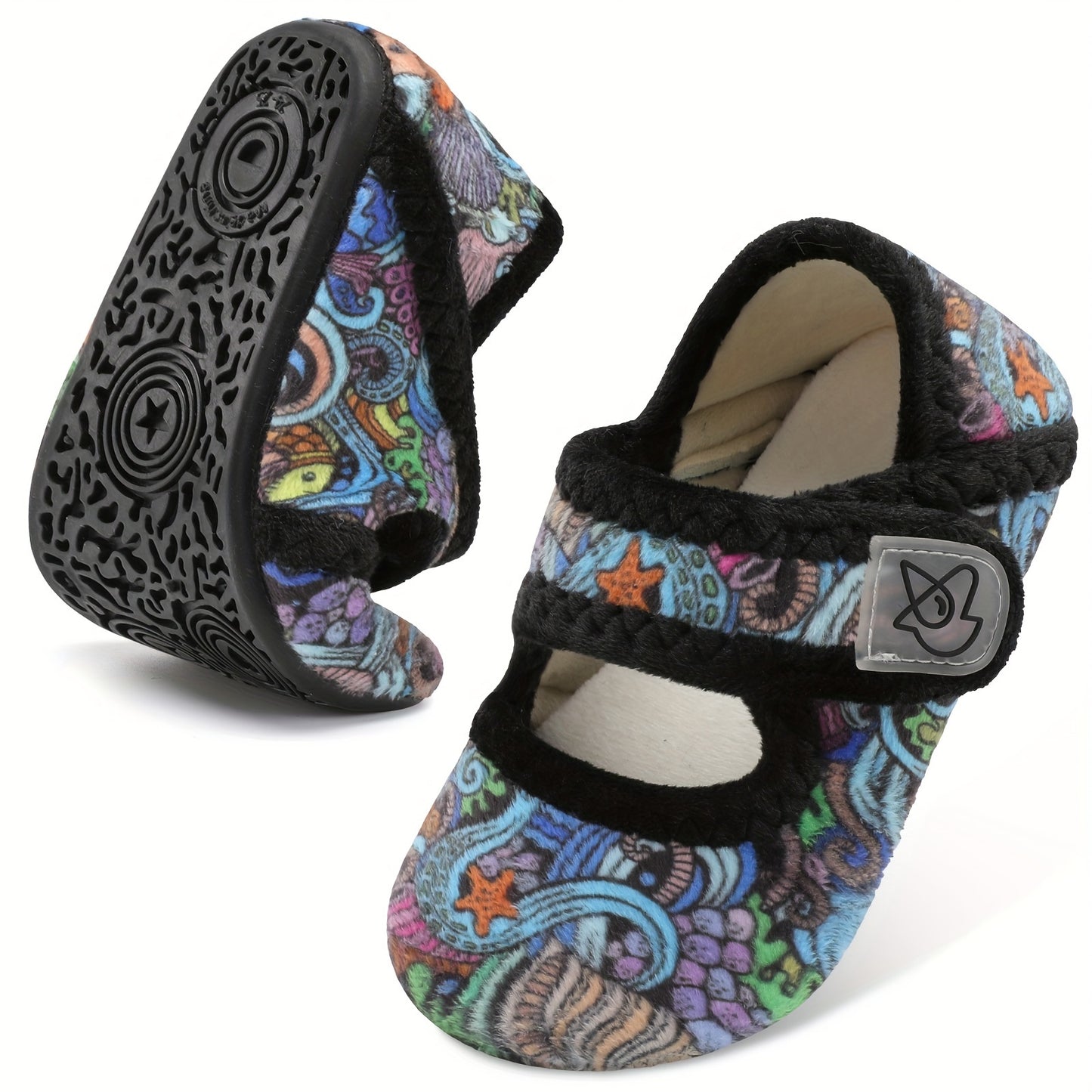 Cozy cartoon house shoes for children, warm and nonslip for indoor winter walking.