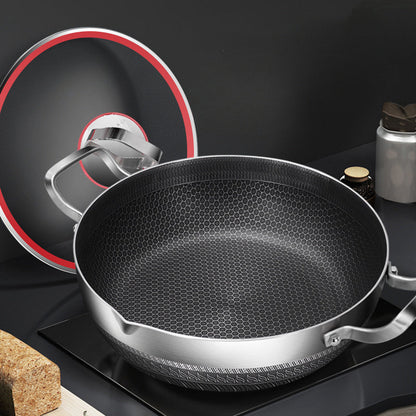 The 10-inch stainless steel frying pan comes with a lid and features a honeycomb non-stick bottom. It is induction compatible and has dual handles, making it versatile for use in various cooking methods such as hot pot and frying.