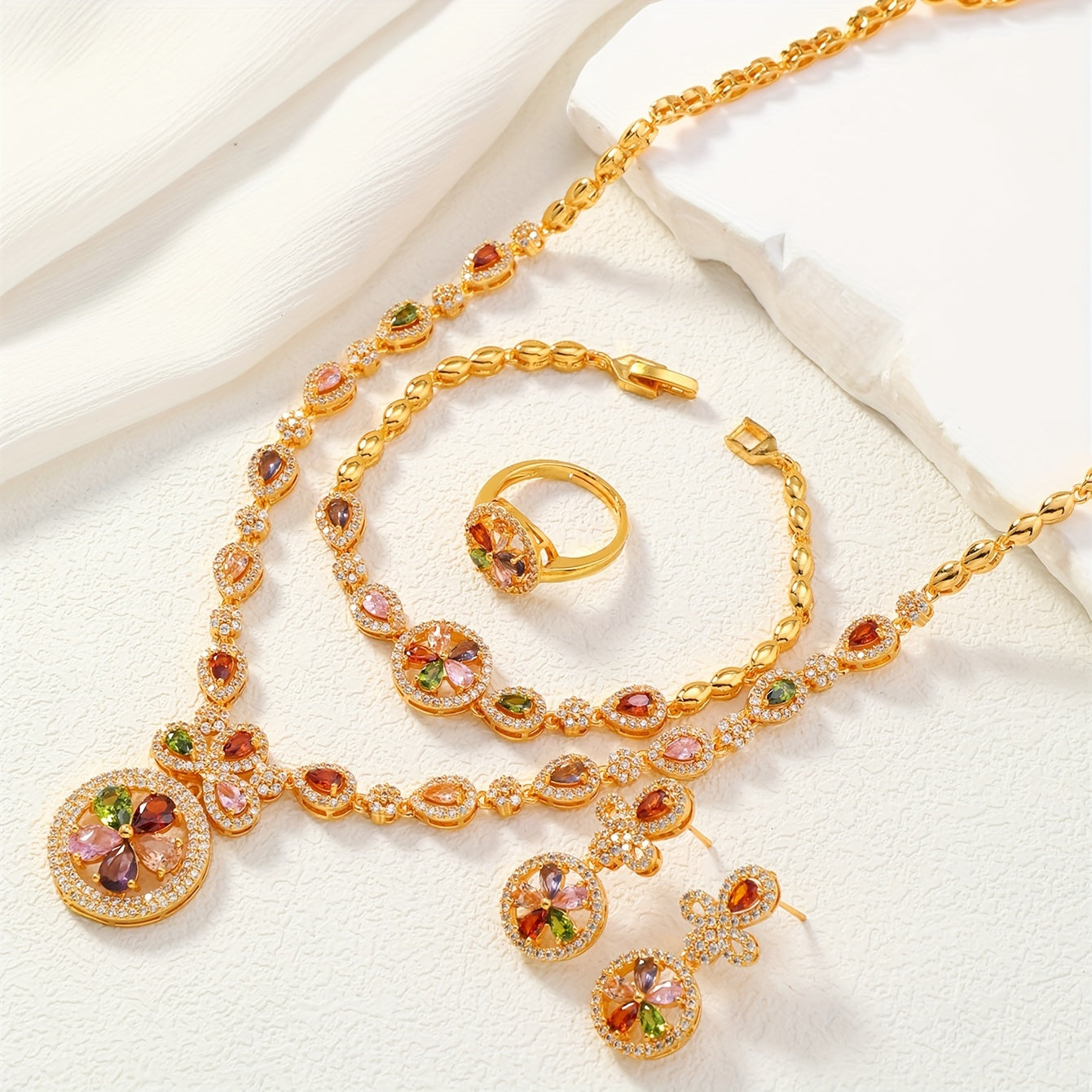 Elegant Women's 4-Piece Jewelry Set with Vintage Luxury Vibe - Featuring 24K Gold Plated Copper and Synthetic Zirconia Stones in a Timeless Circle Motif. Includes Necklace, Bracelet, Ring, and Earrings - Perfect for Weddings, Banquets, or as a Thoughtful