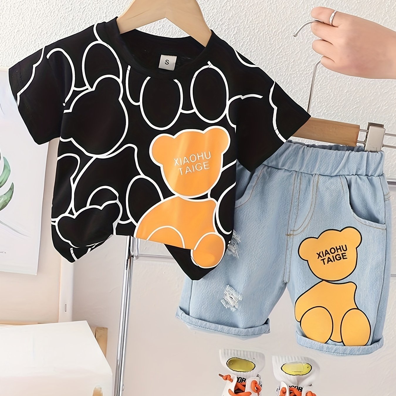 Kids summer clothes set featuring cute cartoon t-shirt and shorts for toddler boys and girls. Ideal for outdoor activities.