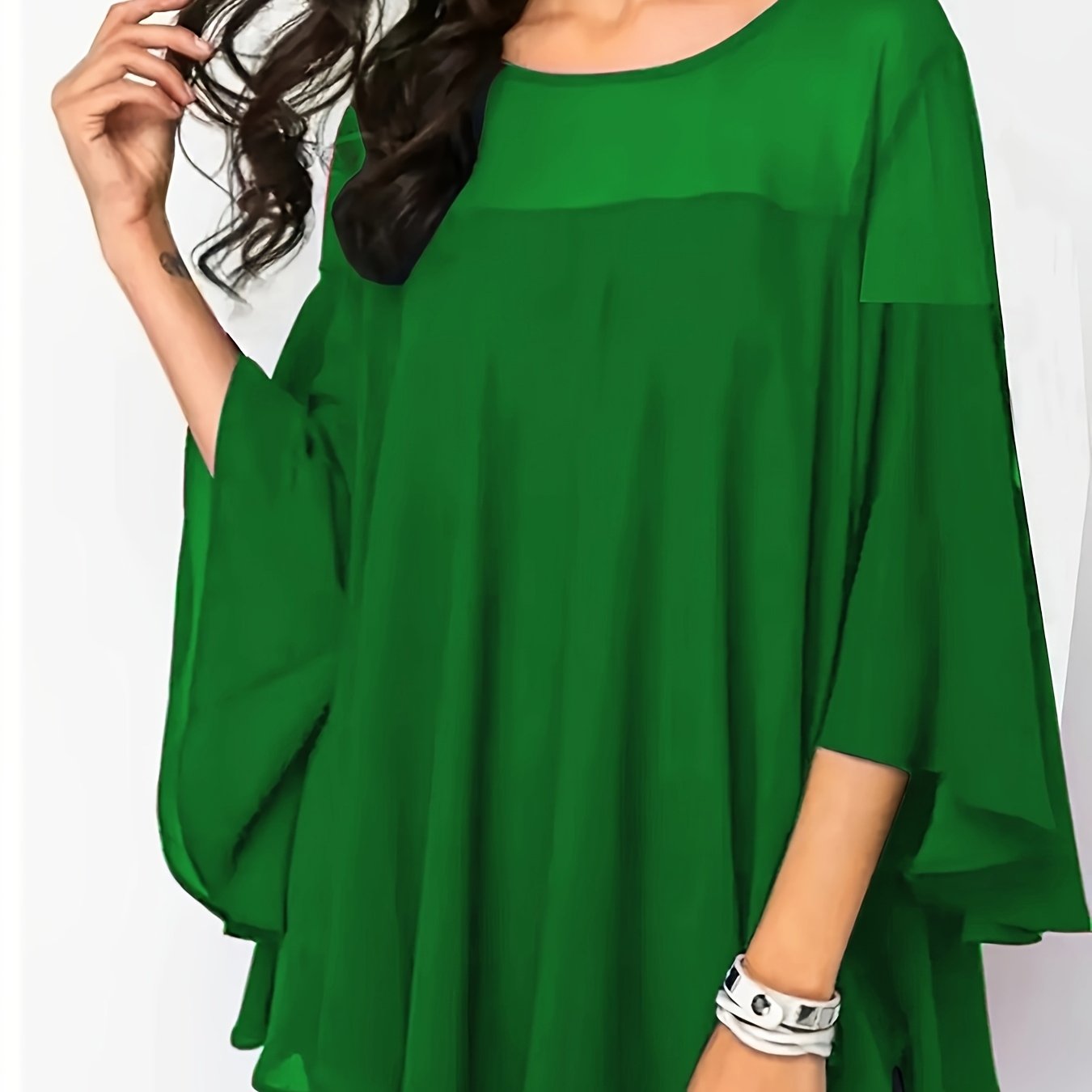 Women's plus size green blouse with elegant lace detail, half sleeves, round neck, and non-stretch polyester. Machine washable.