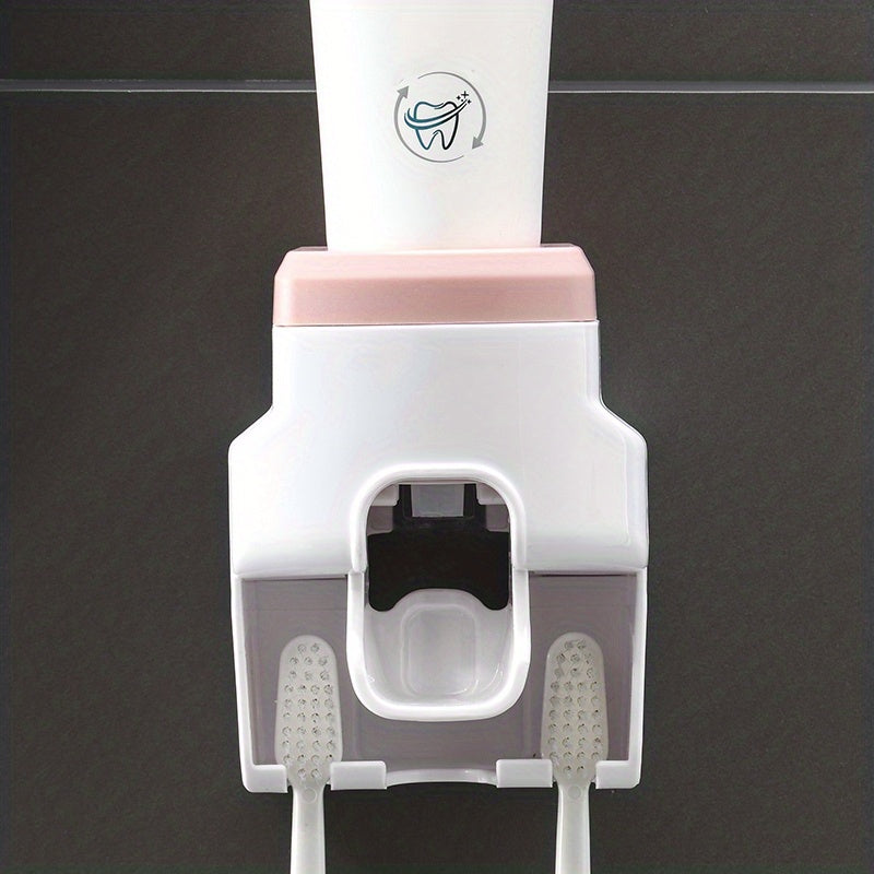 Wall mounted toothbrush holder and toothpaste dispenser with automatic squeezer, ideal for family washroom.