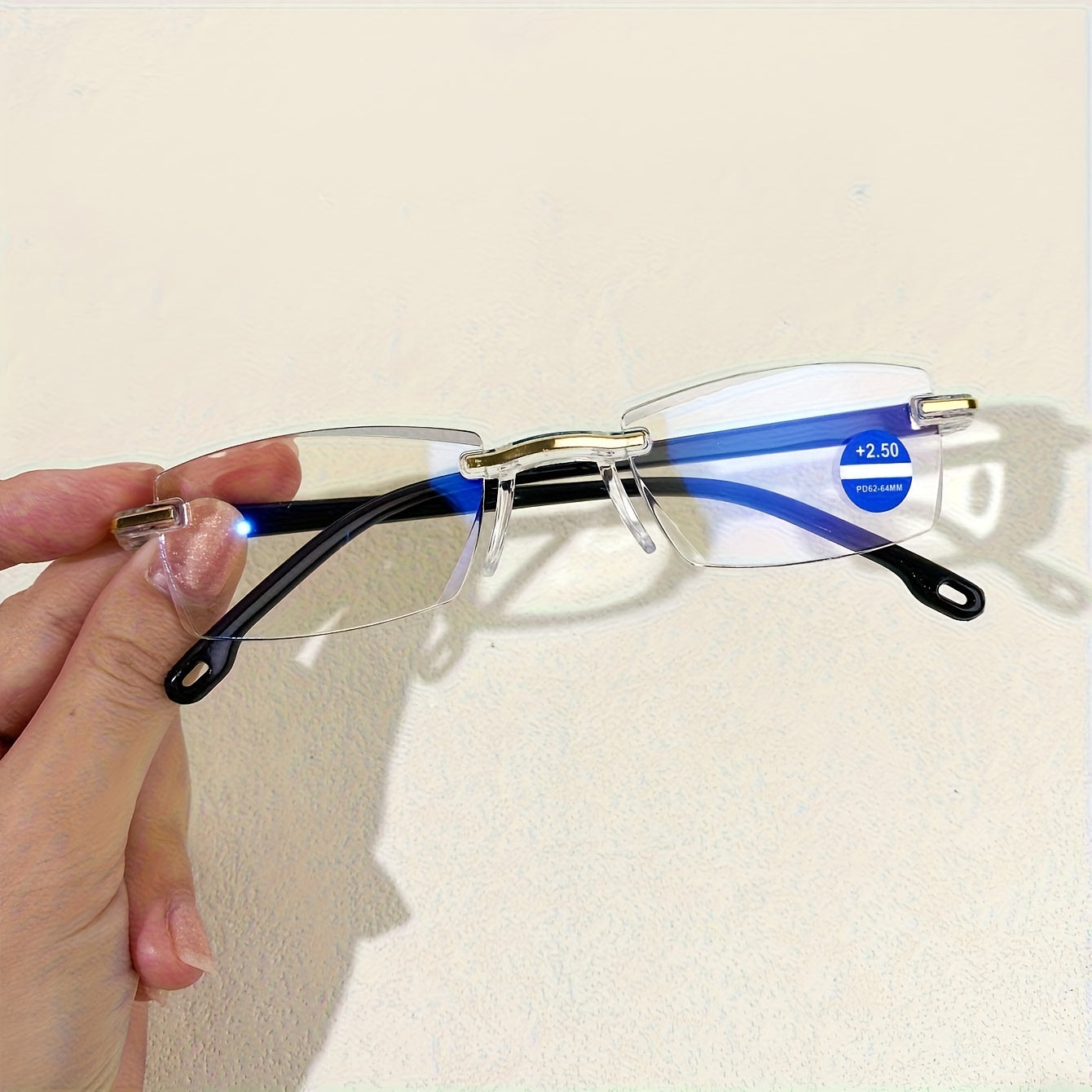 4 Rimless Blue Light Blocking Reading Glasses for Men and Women, designed to reduce eyestrain.