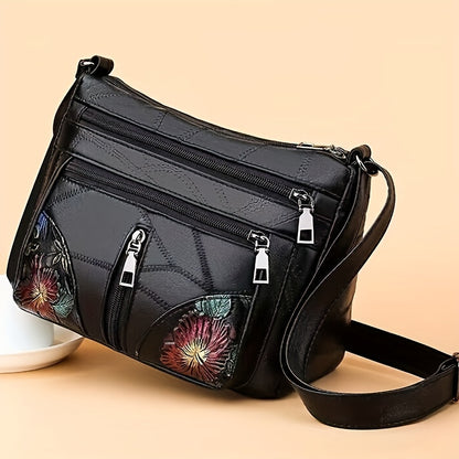 Women's neutral square bag with soft texture, random zipper direction.