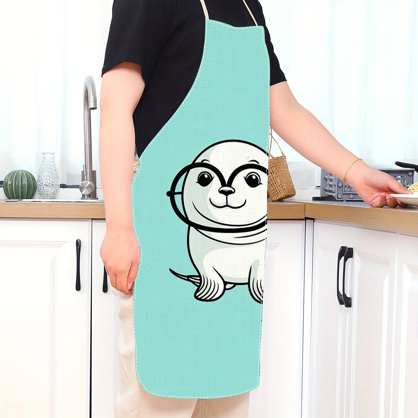 This linen kitchen apron features a fun animal cartoon print that is perfect for both men and women. Made from comfortable and breathable linen material, this apron is also waterproof, oil-resistant, and stain-resistant. The fabric is thick and easy to