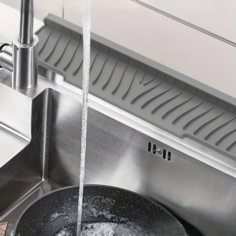 Get the 1pc FlexiGuard Silicone Sink Splash Guard and Drip Catcher Tray for Kitchen & Bathroom - Slim Water Barrier with Anti-Slip Countertop Protection Mat.