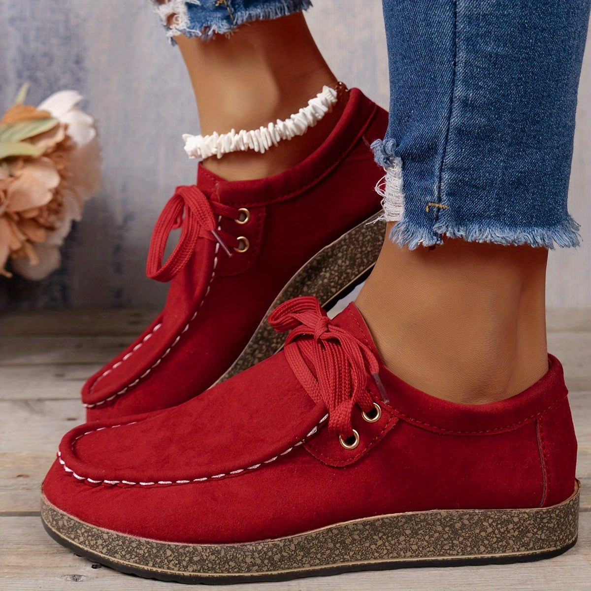 Women's casual sneakers with lace-up design and soft platform sole, a versatile low-top style available in plus size.