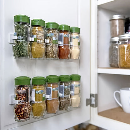 A convenient kitchen organizer, this spice bottle storage rack features a wall-mounted self-adhesive design that can be easily cut to size for simple installation and easy access to all your spices.