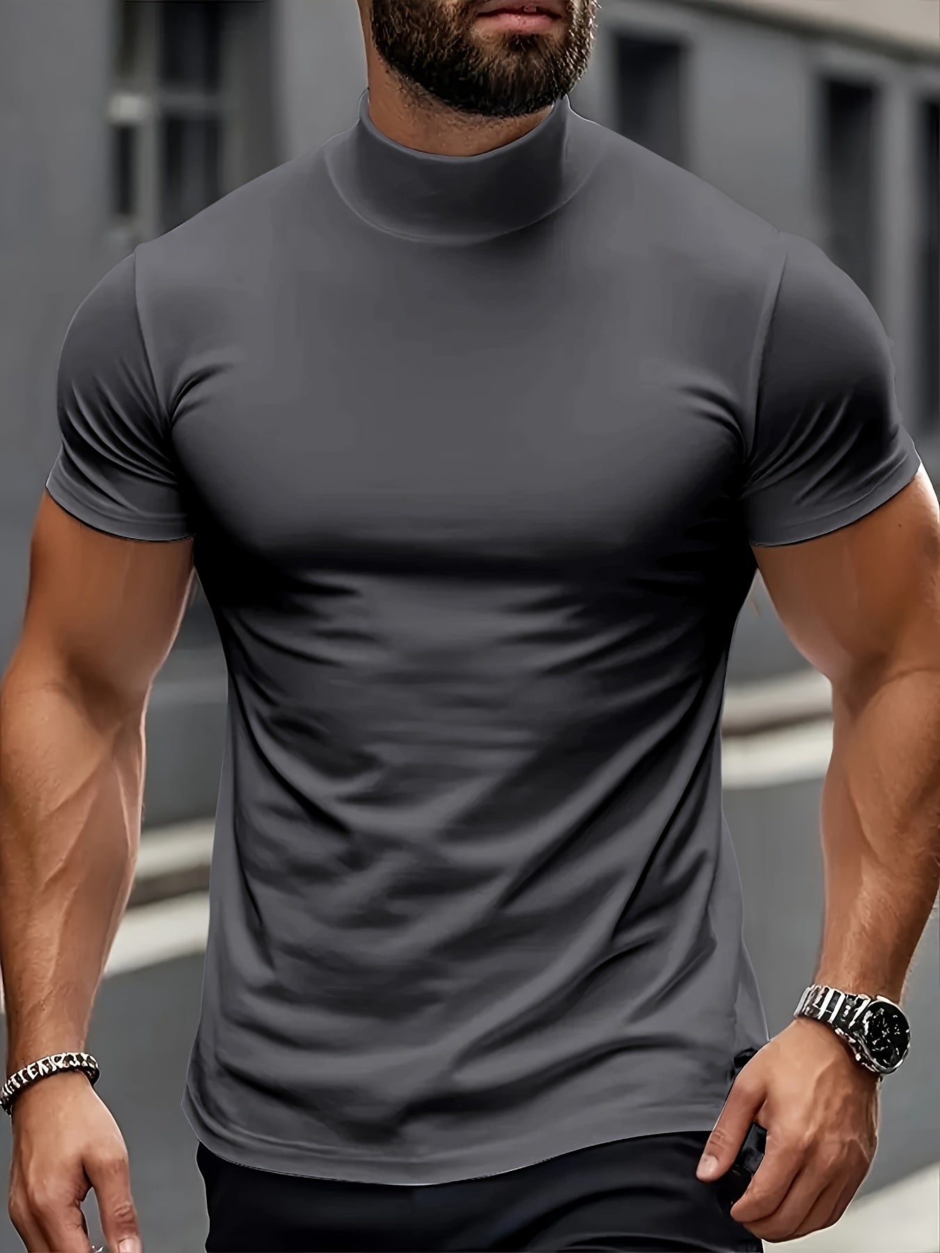 Men's slim fit short sleeve t-shirt with stand collar, ideal for gym and outdoor activities, made of breathable polyester-spandex blend, suitable for all-season wear.