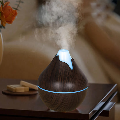 USB powered humidifier with aromatherapy, quiet operation, wood grain design, suitable for home and office.