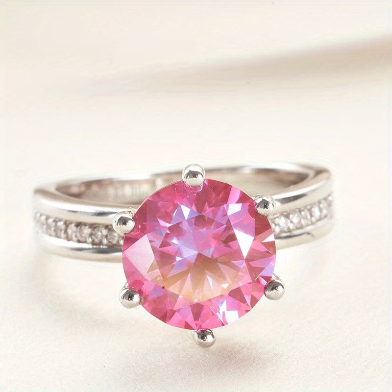 Elevate your style with the stunning Shavano Luxury 2.0 Carat Pink Moissanite Ring. Crafted in S925 Sterling Silver, this elegant and unique design is perfect for special occasions like weddings and vacations. It also serves as a timeless December