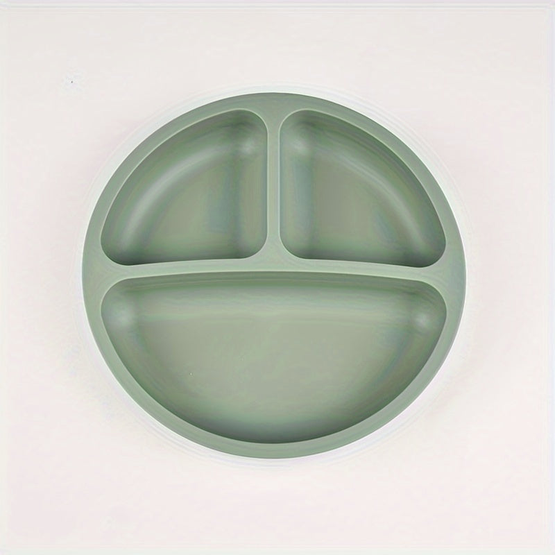 Three-compartment round dinner plate made of 100% food-grade silicone, featuring a reinforced design for added thickness and durability. This high-temperature resistant soft plate is perfect for training and comes with training tableware compartments.