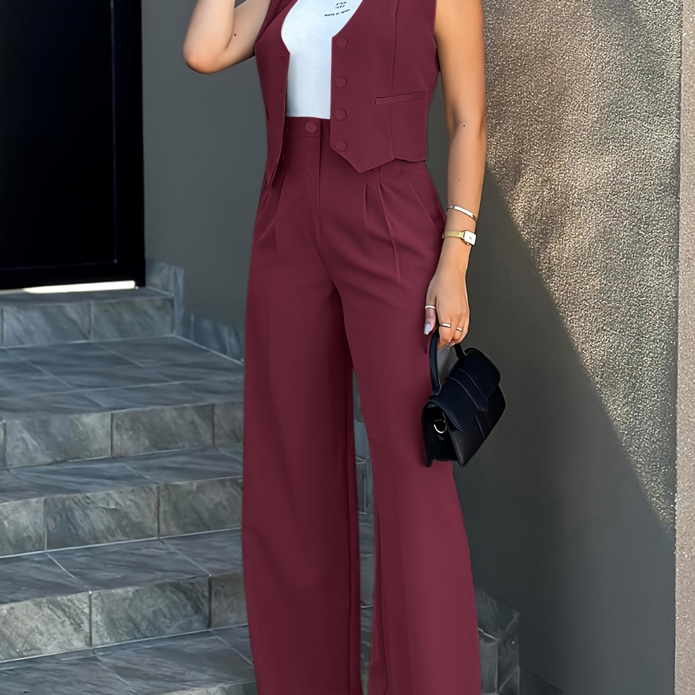 Women's stylish solid color pantsuits with button front fake pocket sleeveless vest and high waist pleated pants.