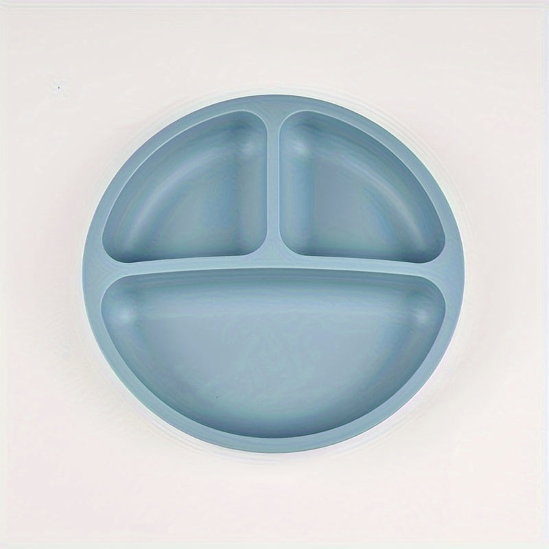 Three-compartment round dinner plate made of 100% food-grade silicone, featuring a reinforced design for added thickness and durability. This high-temperature resistant soft plate is perfect for training and comes with training tableware compartments.