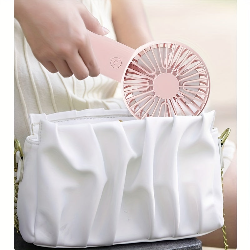 Portable USB Mini Fan in White, Blue, and Pink with Touch Control - Perfect for Office, Travel, Camping, and Picnics. Wearable design makes it convenient to carry around. Rechargeable with Built-in Lithium Battery for on-the-go cooling. Get the Mini Fan