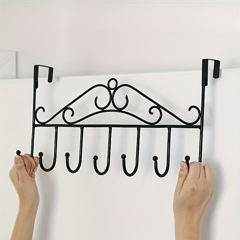 Simple over-the-door metal storage rack with hooks for coats, keys, and umbrellas. Easy to install without drilling. Great for entryway, bedroom, bathroom, or kitchen. Casual style door