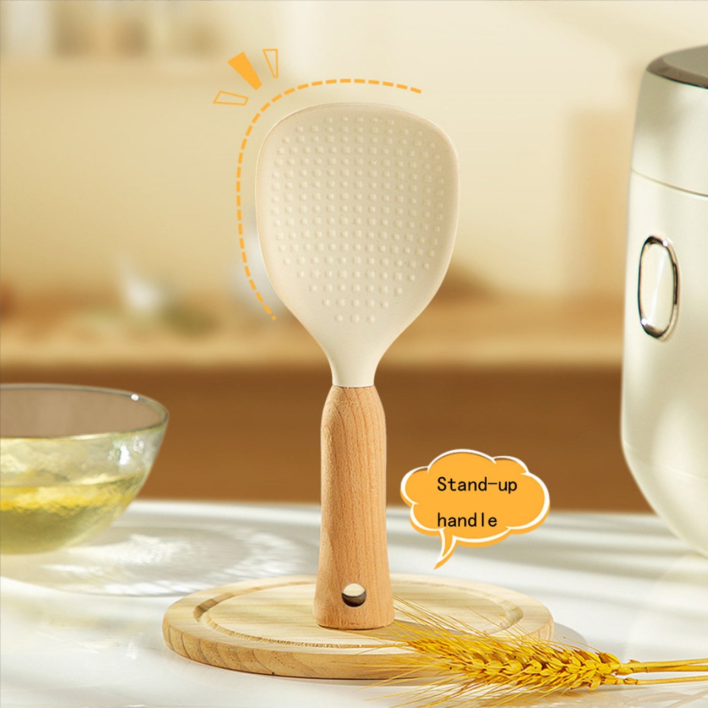 Silicone rice spoon with wooden handle, ideal for non-stick cookware, durable and convenient serving utensil.