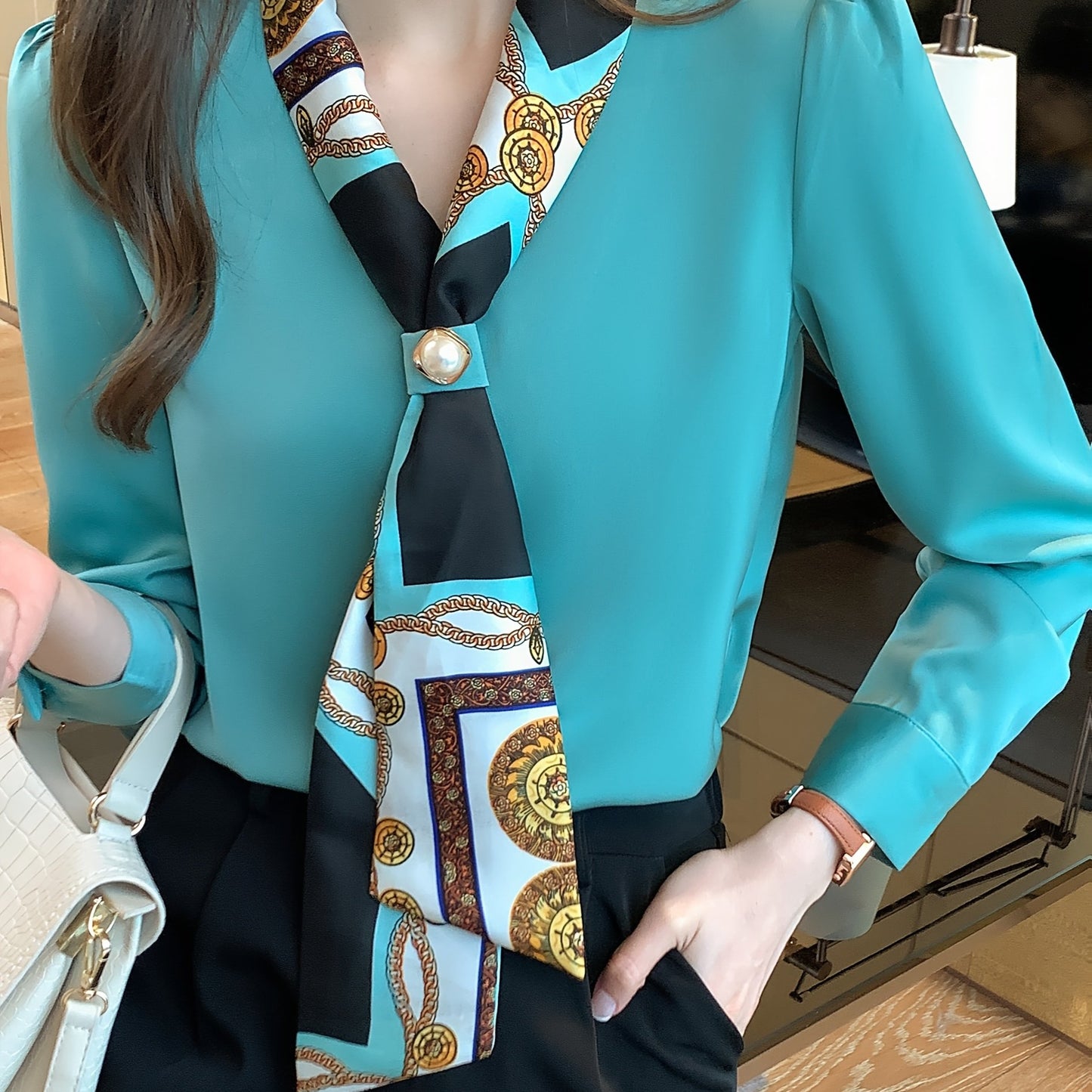 Polyester tie neck blouse with long sleeves, button detail print for women. Regular fit woven top, fashionable all-season style.