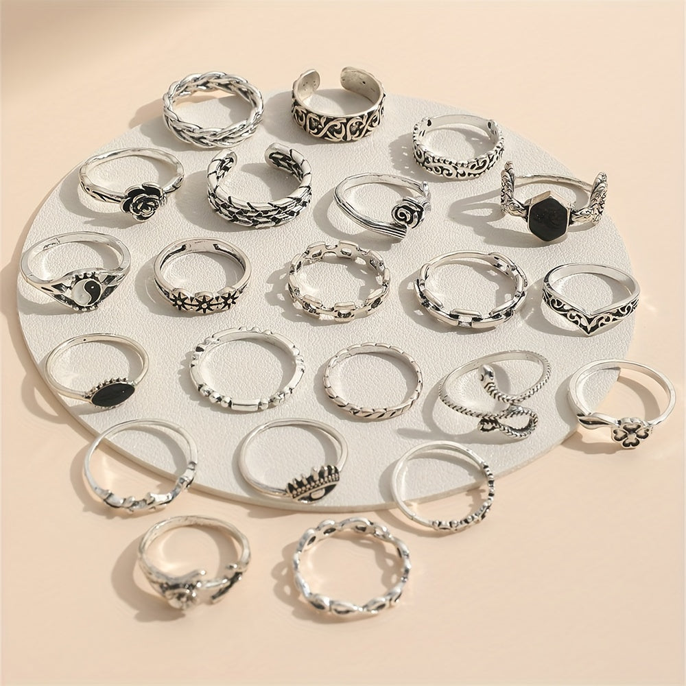 A collection of 22 vintage-inspired oil drop gossip snake eye rose carved joint rings suitable for both men and women.