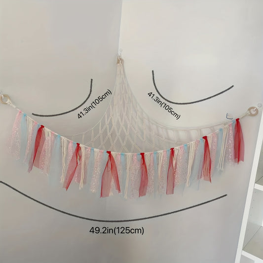 Large stuffed animal storage hammock with tassel decor, perfect for organizing toys in nursery or playroom. 104.9x104.9x124.97cm dimensions.