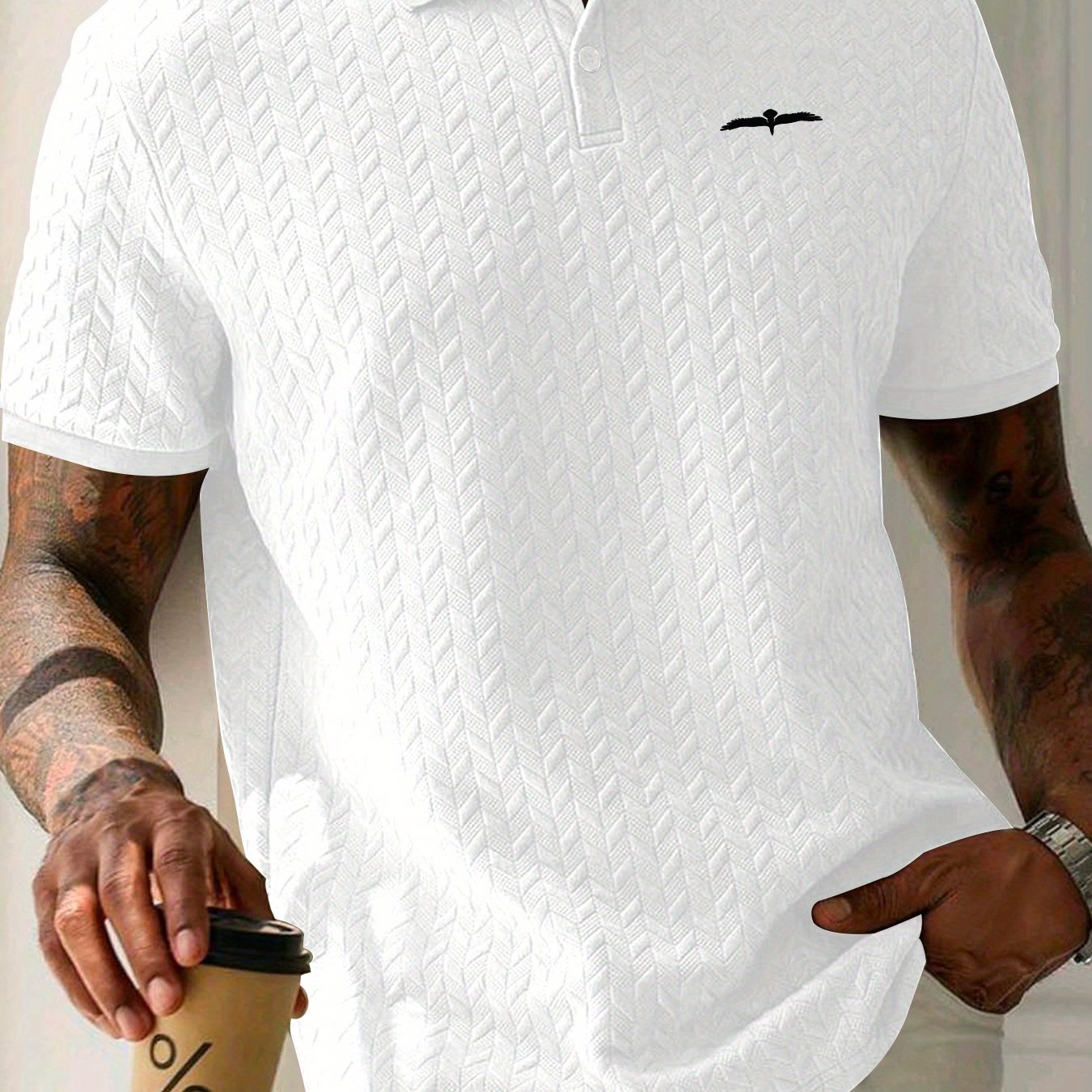 Men's polo shirt with eagle print, short sleeves, and slight stretch. Ideal for summer sports and leisure.