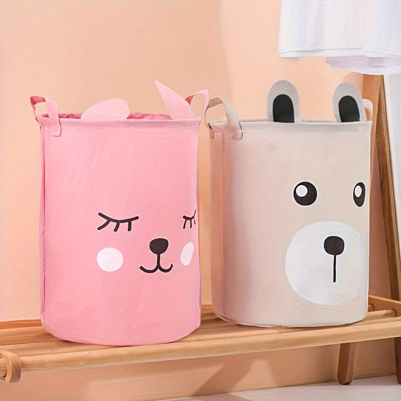 A fun and functional hamper featuring a cartoon pattern, made of linen fabric with cute ears design. Perfect for organizing and storing clothes, toys, and other items. Ideal for use in the bathroom, bedroom, living room, or laundry room.