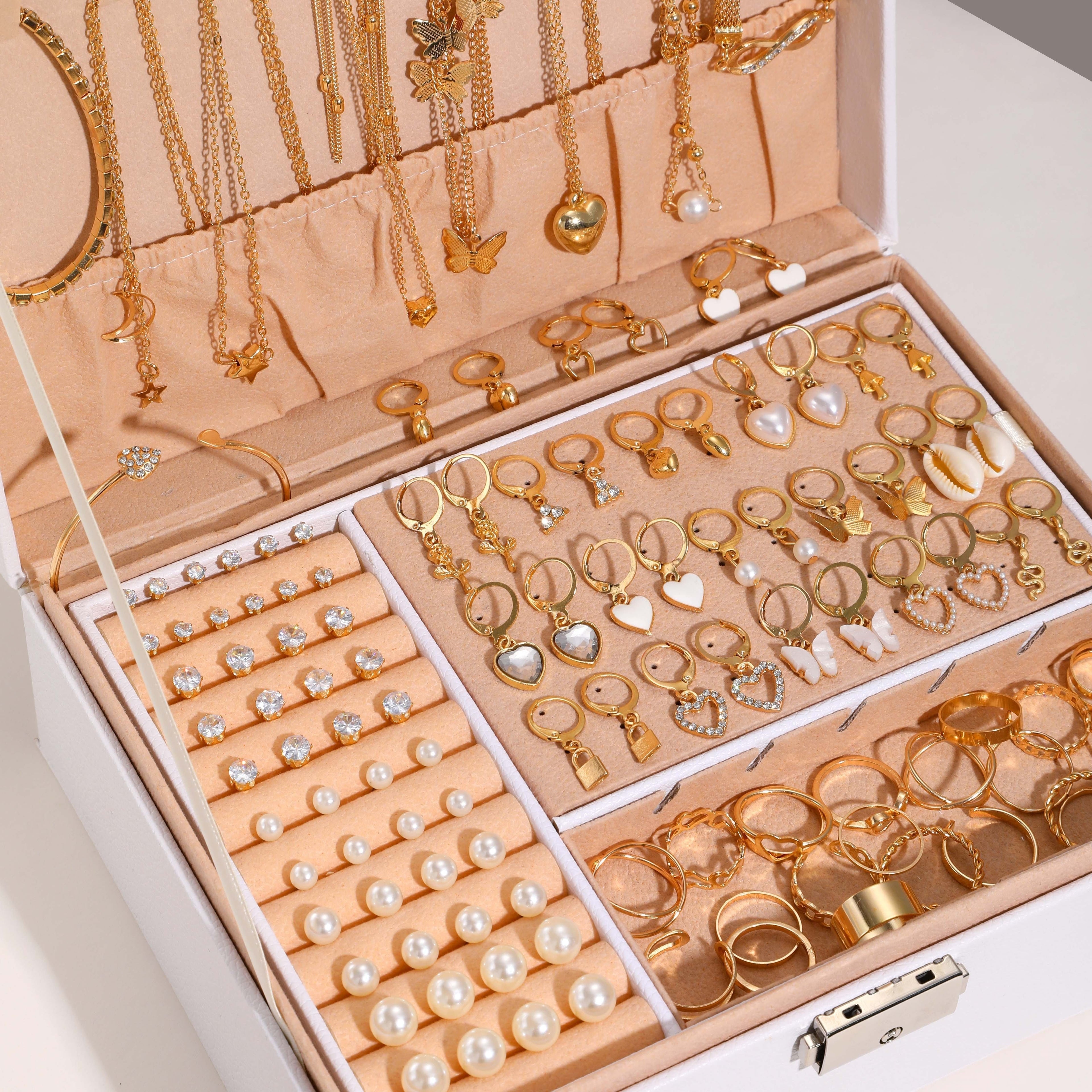 This stunning 115-piece jewelry set for women exudes vintage luxury with elegant zirconia, heart, and butterfly pendants. The set includes necklaces, bracelets, earrings, and rings, perfect for both casual attire and parties. Ideal as a Valentine's gift