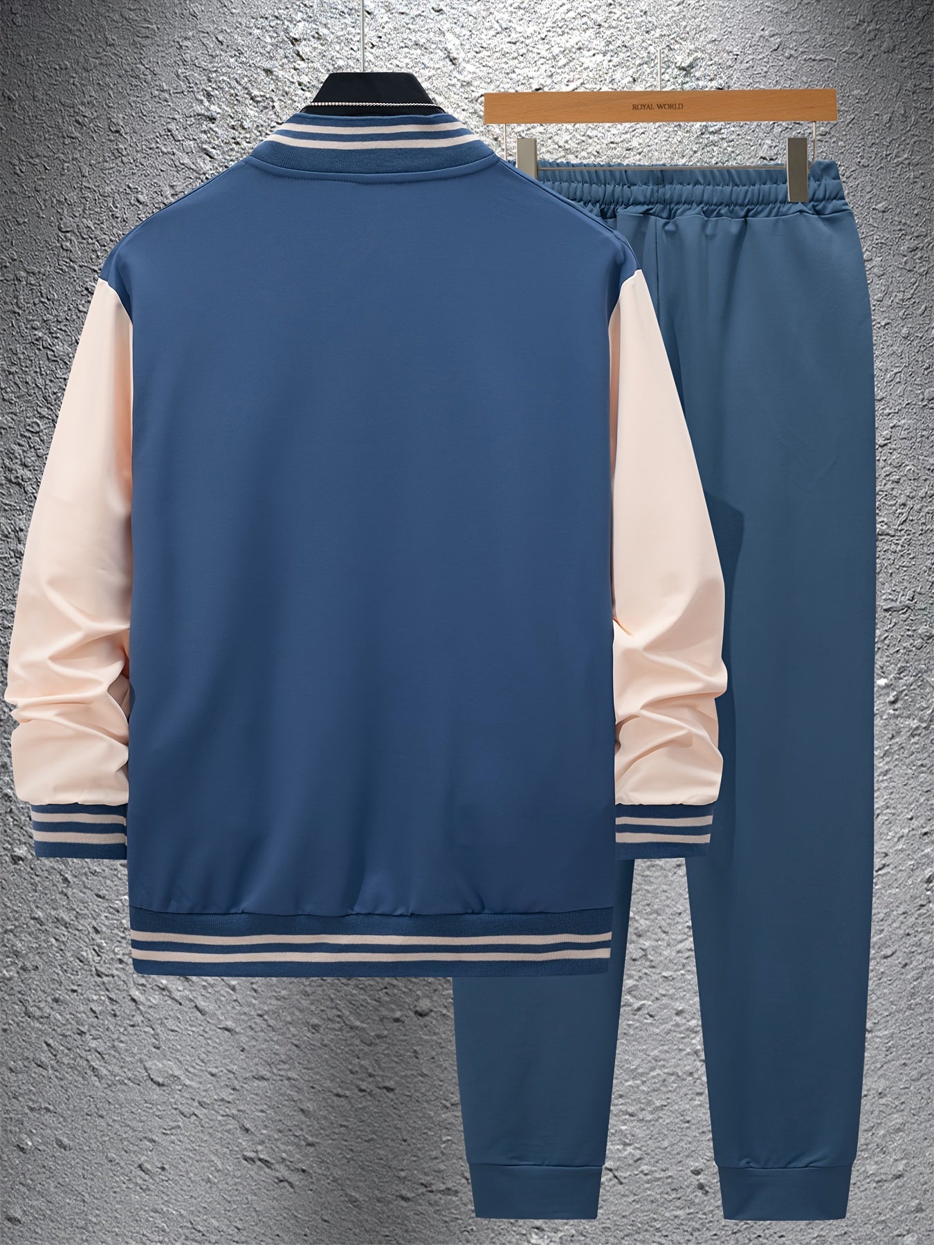 Men's casual baseball collar jacket and pant set in color block, with long sleeve sweatshirt and sweatpants made of polyester. Features button detail and is part of the Spring/Fall