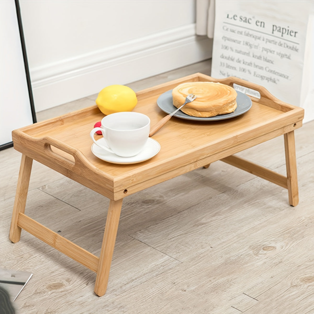 Multifunctional wooden bed tray with folding legs, perfect for breakfast, snacks, work, or study in bed or on the sofa. Great for picnics, camping, dorm rooms, and home use.