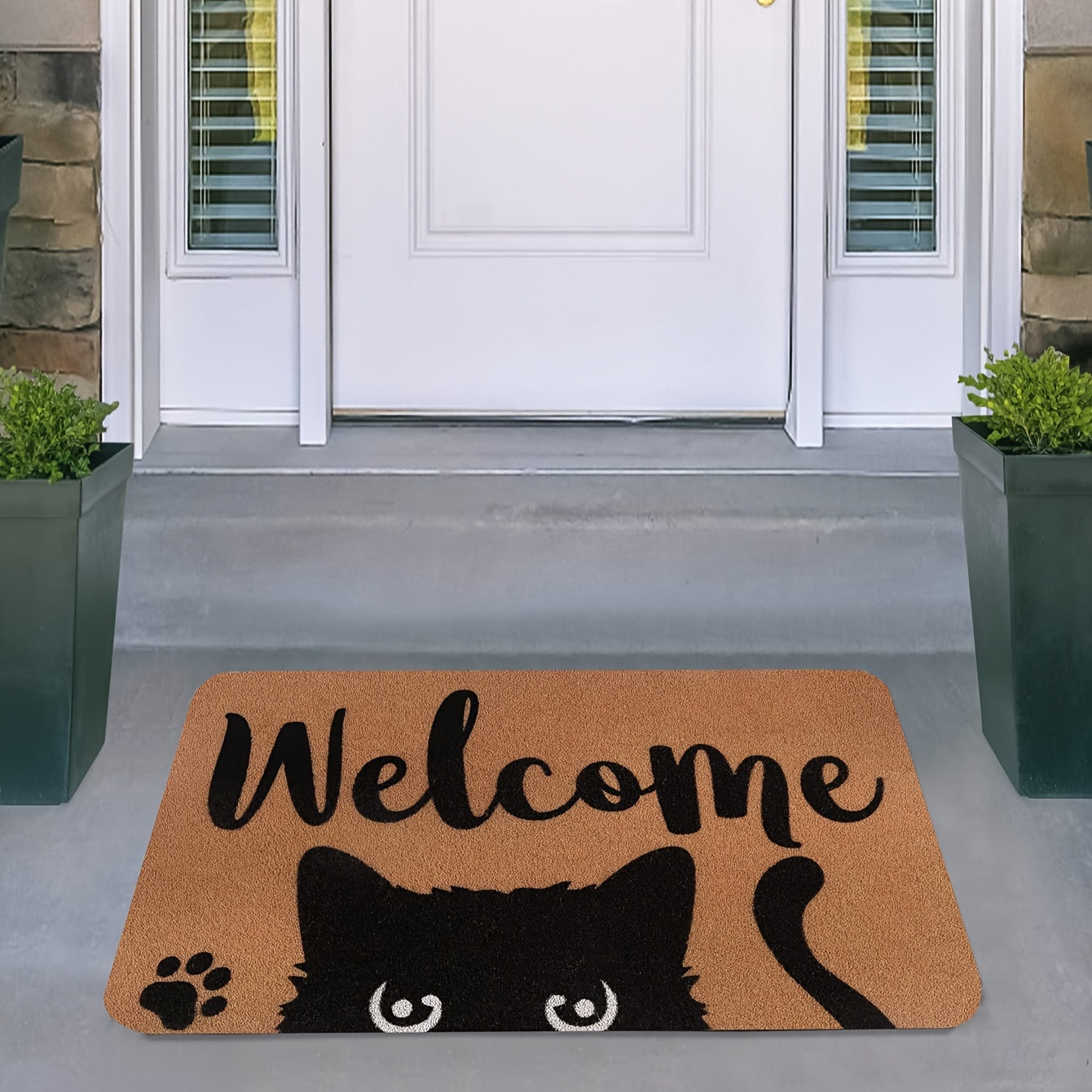 Introducing our Cat Welcome Doormat, featuring a non-slip backing for safety. Made from machine washable polyester, this indoor/outdoor rug is perfect for any entrance, porch, laundry room, or office. The fun cat design adds a whimsical touch to your