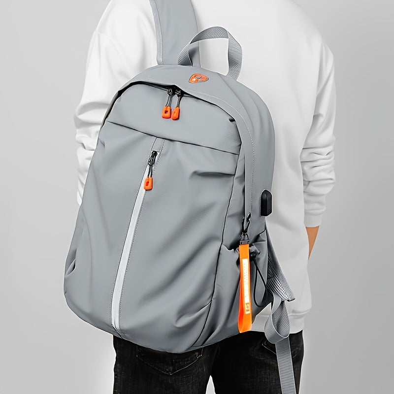 Men's light gray backpack made of stylish polyester with zippered compartments, adjustable straps for school and outdoor travel.