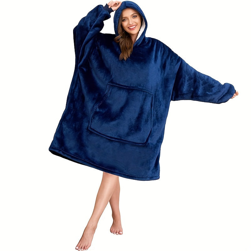 One piece of an oversized hooded blanket made from super soft flannel fabric. This wearable blanket features a stylish hood and a convenient pocket, providing warmth and comfort in cold weather.