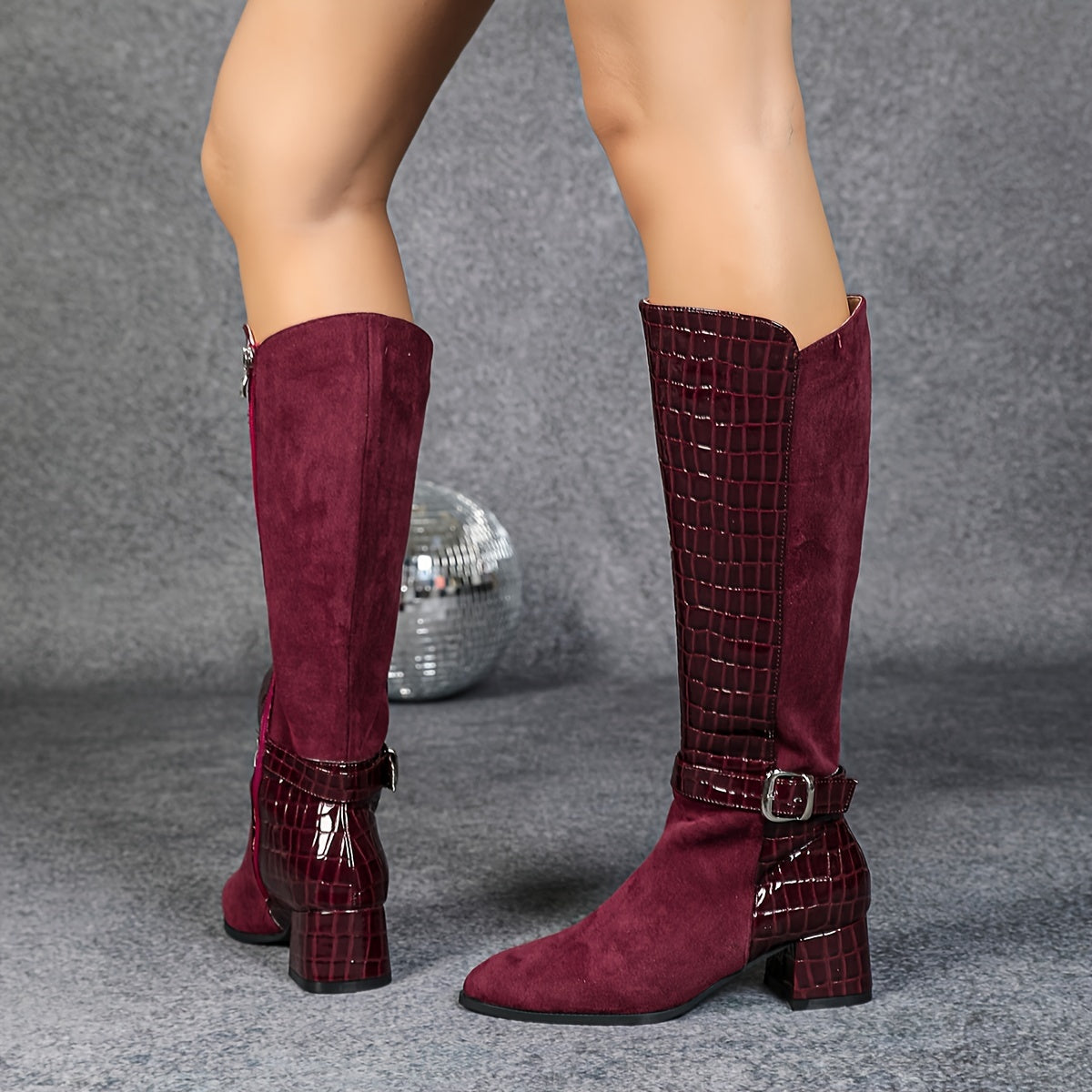 Wine red mid-heeled boots with pointed joints and side zippers, knee-high plush winter boots for a knightly look.