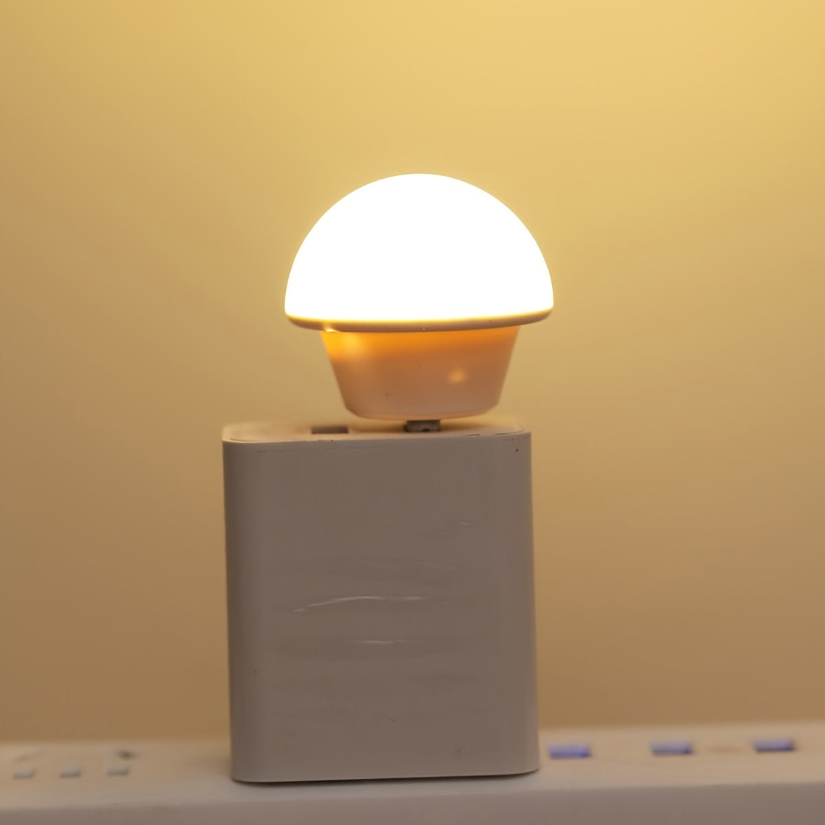 Compact, portable LED lamp for desktop use.