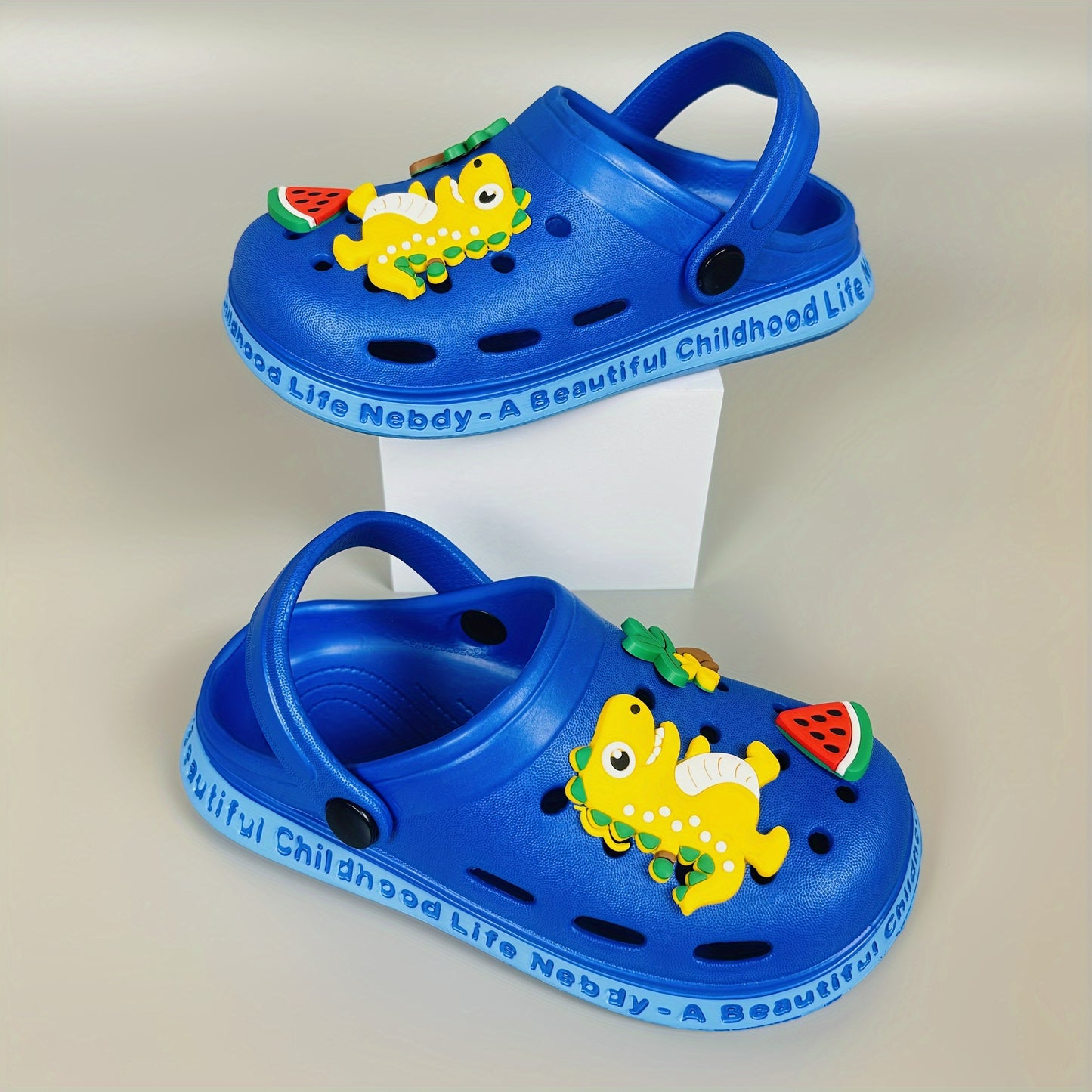 Kids' dinosaur clogs - breathable, non-slip, quick-dry shoes for boys and girls, suitable for all seasons.