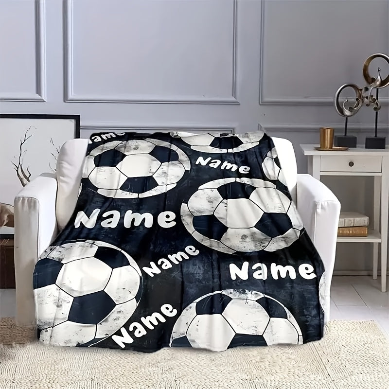 Customize your soccer ball patterned throw blanket with your name in a contemporary style. This all-season blanket is made of knitted 100% polyester, featuring a digital print that is tear-resistant and machine washable. Perfect for use on the sofa, bed