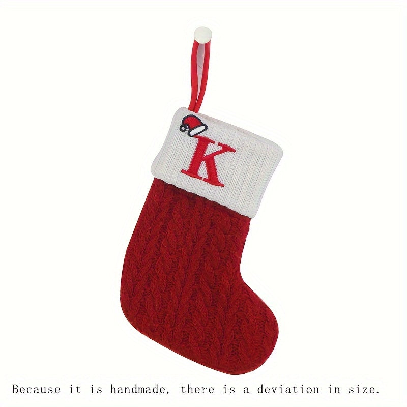 11" Christmas stocking with knitted alphabet design, perfect for hanging on the Xmas tree or using as a gift bag. Made of polyester.