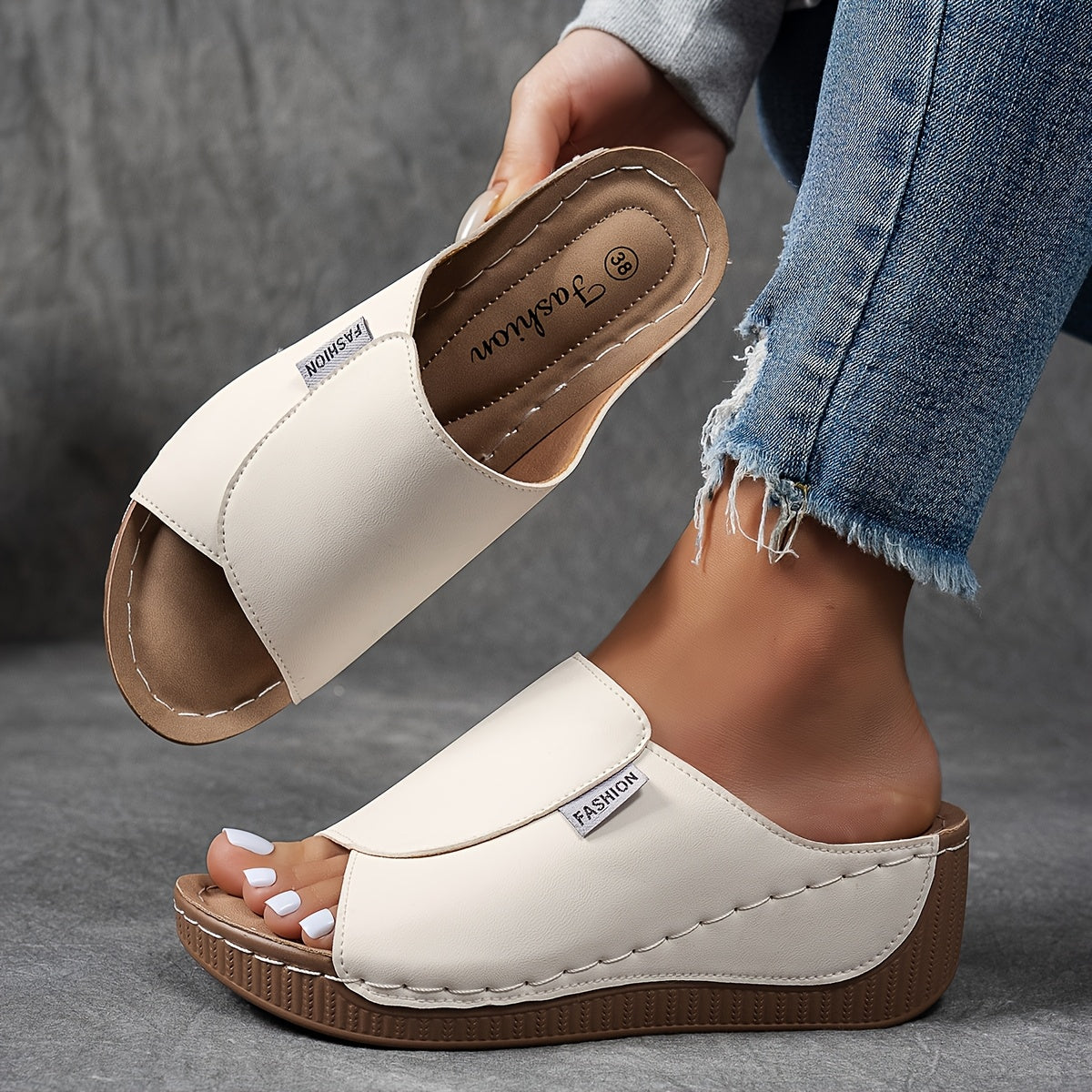 Comfortable slides with arch support and breathable design for stylish and versatile everyday wear.