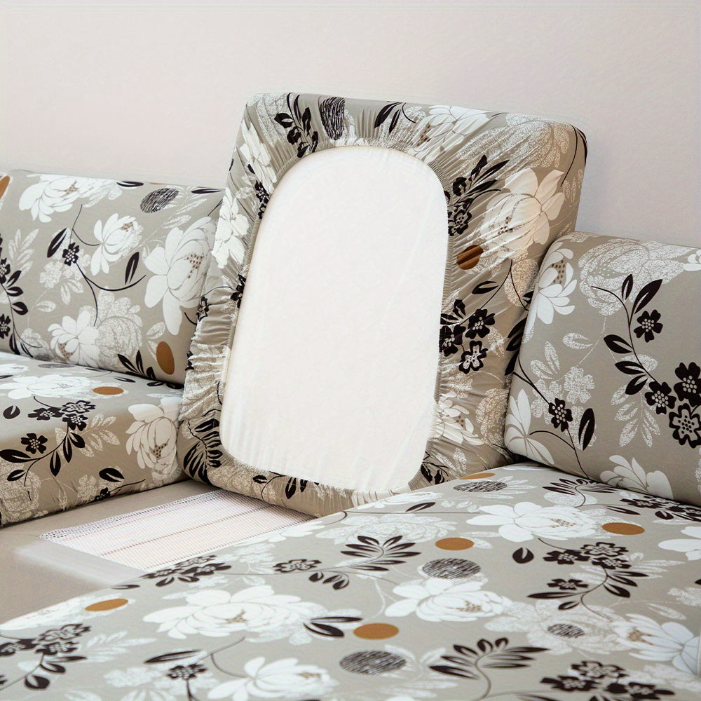 Waterproof flower printed sofa slipcover for furniture protection in various settings.