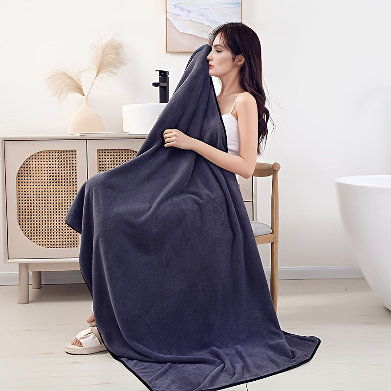 Large bath towel for the home bathroom, absorbs quickly and dries fast, soft and skin-friendly, ideal bathroom supply.