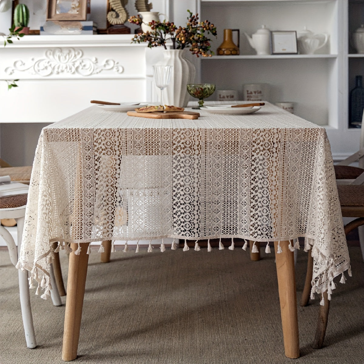 Bohemian chic crochet lace tablecloth, ideal for dining and parties. Rectangular polyester design with a farmhouse style, perfect for boho home decor. Great for buffet tables, banquets, and serving western food.