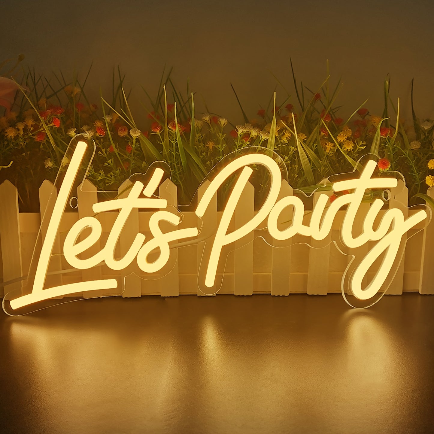 Neon 'Let's Party' sign ideal for festive wall decor in homes, offices, weddings, and holiday parties, powered by USB.