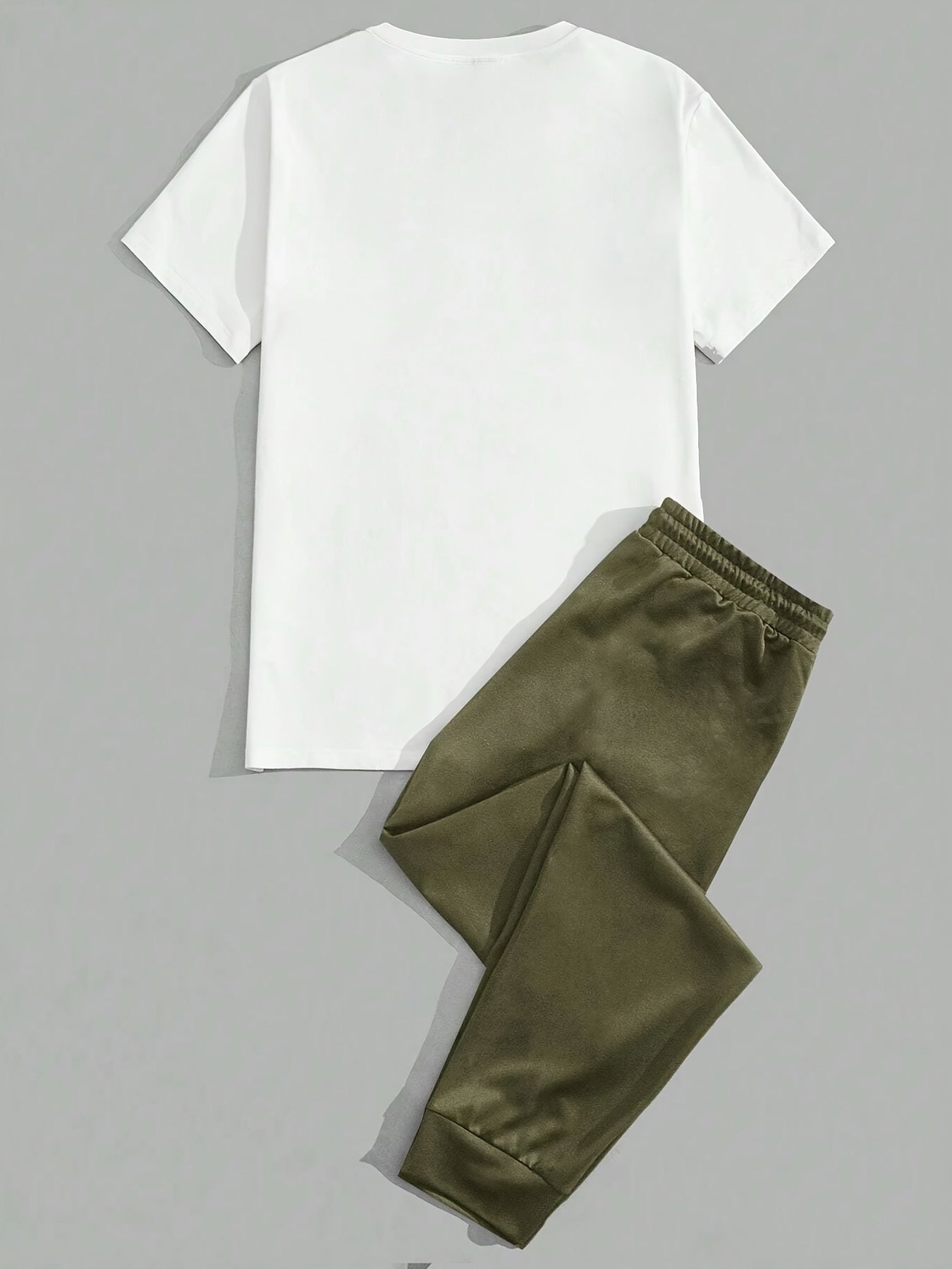 Men's summer outfit with eagle print tee and long pants, great for sports and leisure