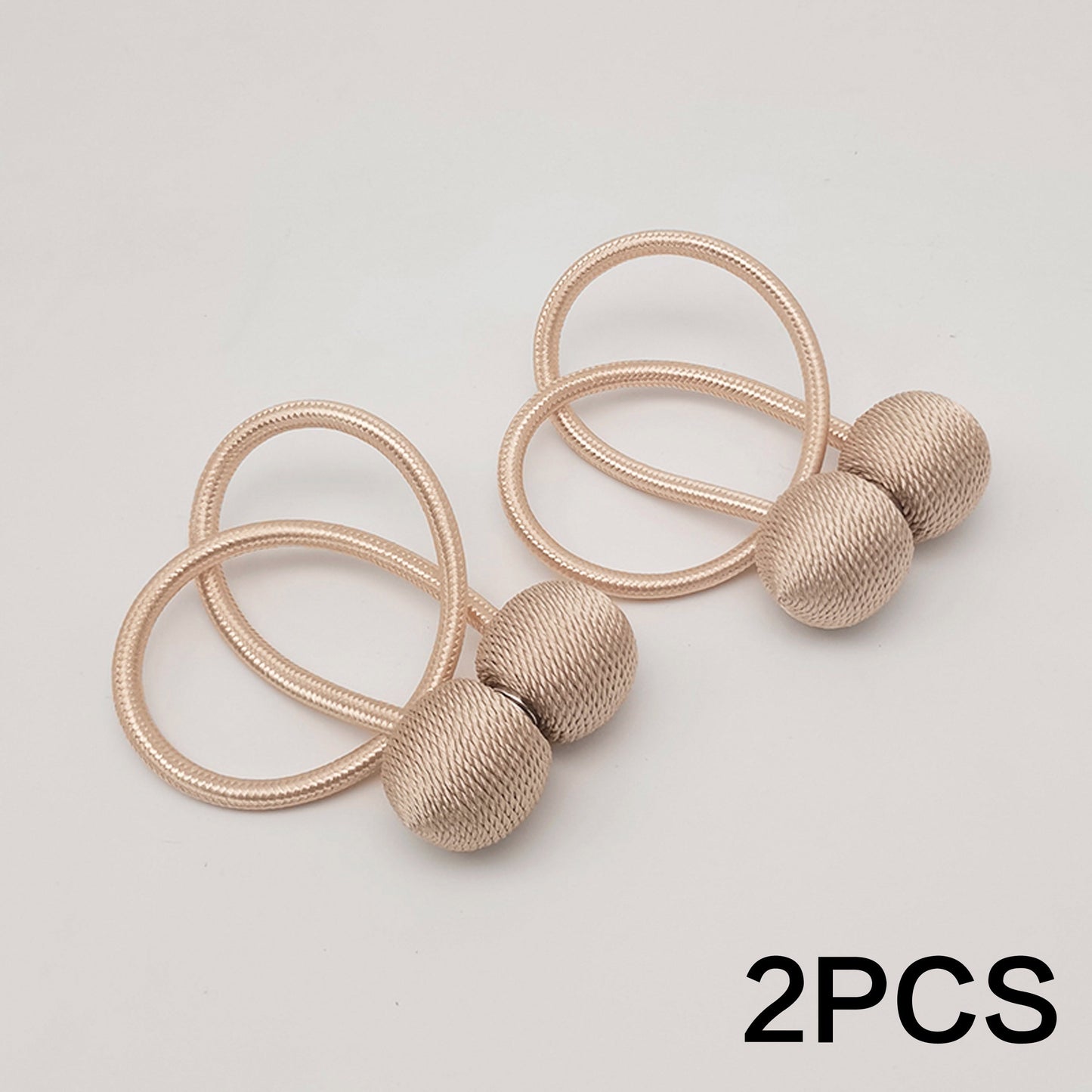 Get your hands on a set of two Classic Style Magnetic Curtain Tiebacks. These tiebacks are designed to be durable and easy to install without any drilling required. Made from polyester twisted rope, they feature a strong magnetic hold to secure your