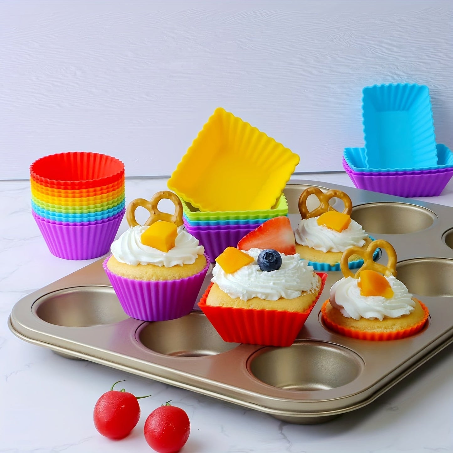 Reusable non-stick silicone baking cups for muffins and cupcakes, sold in packs of 12 or 24.