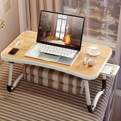 Large portable laptop bed table with cup holder and drawer, ideal for eating, reading, and writing in bed or on sofas.