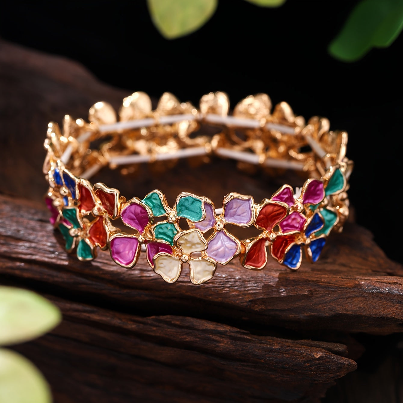 Elegant and timeless, this colorful enamel flower bracelet is made of high-quality zinc alloy. It is designed for women and features a fashionable stretch bangle style that is 18K golden plated. Perfect for daily wear, parties, and holidays, this