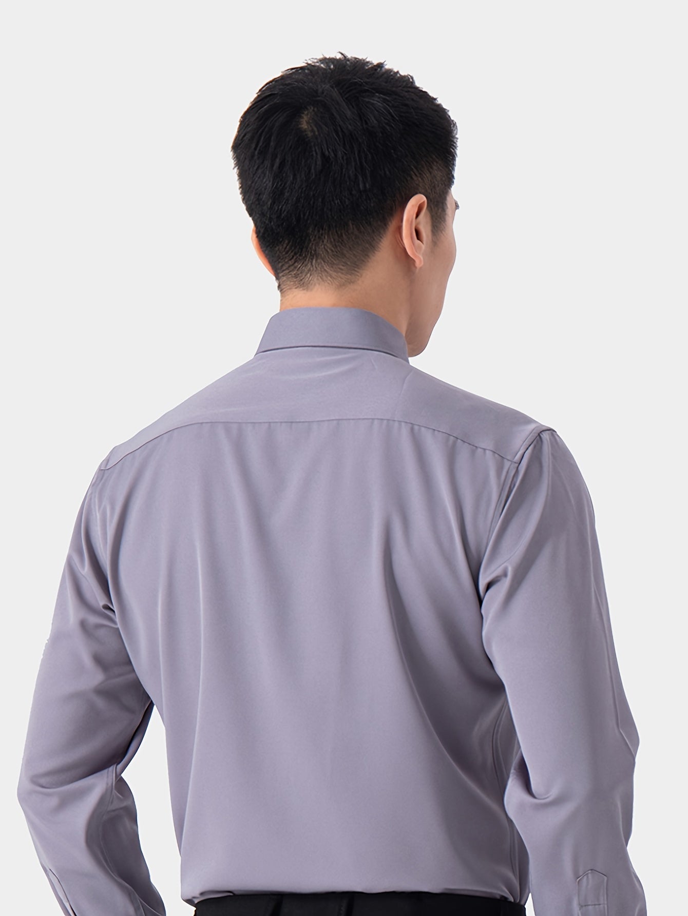 2 Men's work style polyester dress shirts in solid colors, regular fit with button details and lapel collar.