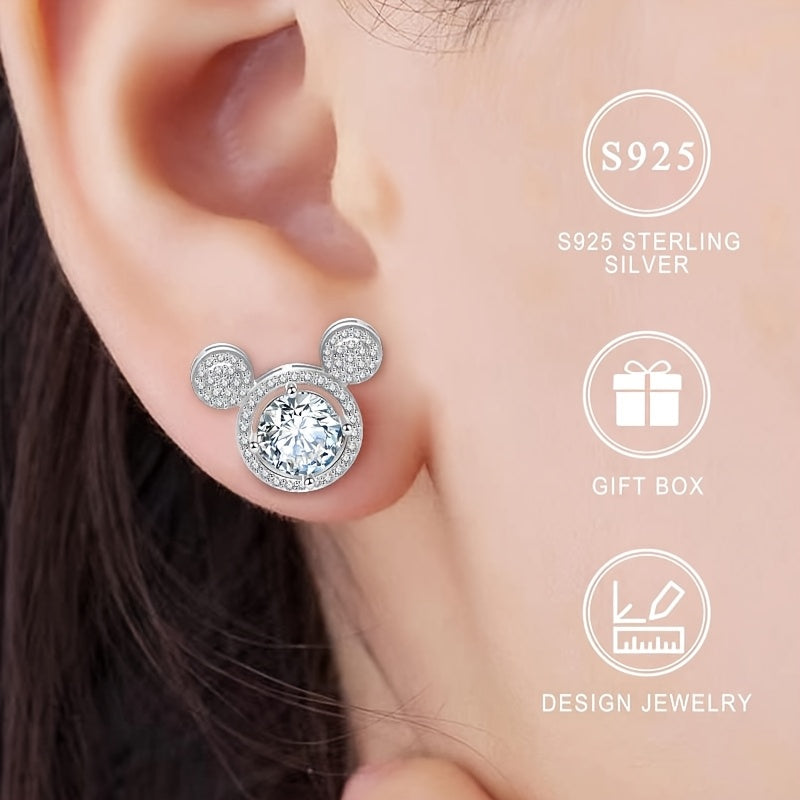 Add a touch of elegance and sexiness with these stunning 925 Sterling Silver earrings featuring a cute Mickey design accented with sparkling cubic zirconia. These large studs are perfect for both daily wear and special occasions. The silver plated